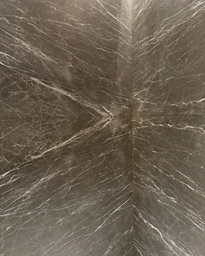 Armani Brown natural stone slab — brown with a crisp white web